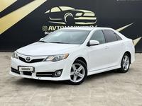 Toyota Camry 2013 годаfor8 950 000 тг. в Атырау