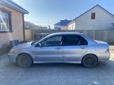 Mitsubishi Lancer 2006 годаүшін2 000 000 тг. в Атырау