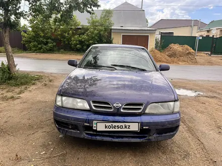 Nissan Primera 1997 года за 600 000 тг. в Актобе – фото 2