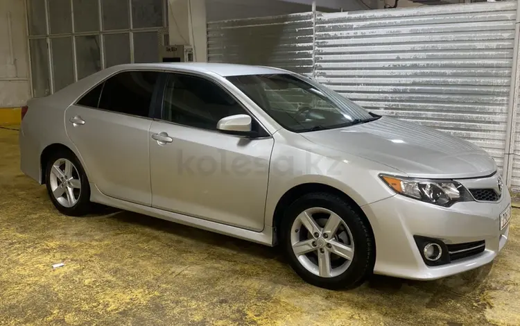 Toyota Camry 2014 года за 6 700 000 тг. в Астана