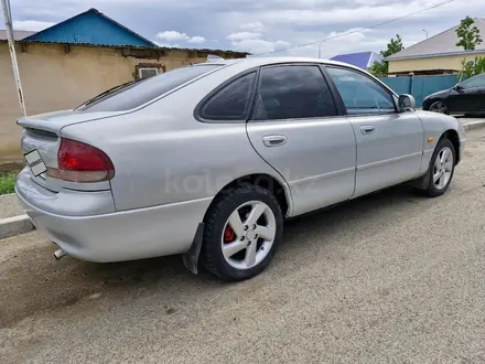 Mazda 626 1994 года за 1 500 000 тг. в Атырау – фото 2