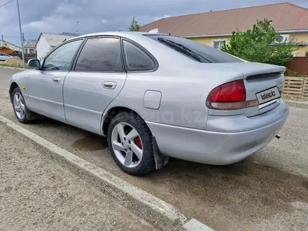 Mazda 626 1994 года за 1 500 000 тг. в Атырау – фото 9