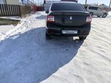 Renault Logan 2015 года за 2 700 000 тг. в Уральск – фото 2