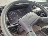 Isuzu  MidiBus NP21 2010 года за 4 000 000 тг. в Астана – фото 2