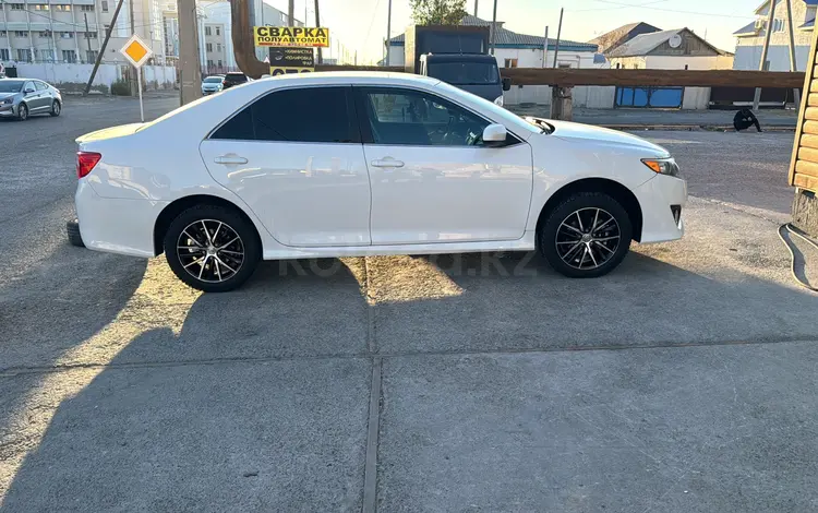 Toyota Camry 2014 года за 6 500 000 тг. в Атырау