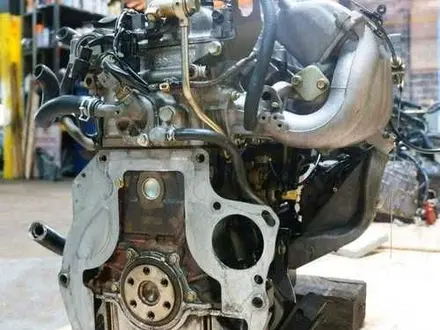 Мазда Mazda двигатель в сборе с коробкой двс акпп за 130 000 тг. в Караганда