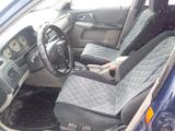 Mazda 323 2002 годаүшін2 500 000 тг. в Астана – фото 5