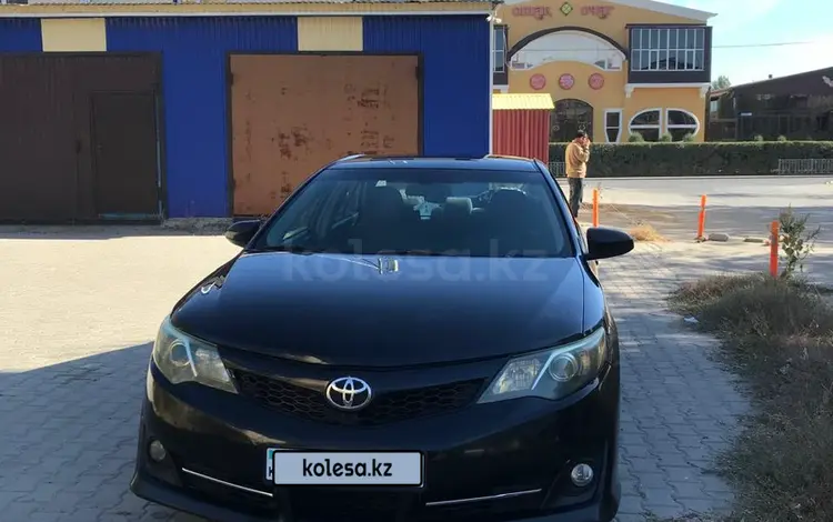 Toyota Camry 2013 годаfor8 400 000 тг. в Актобе