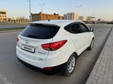 Hyundai Tucson 2012 годаүшін7 600 000 тг. в Караганда – фото 2