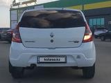 Renault Sandero 2013 года за 2 800 000 тг. в Уральск – фото 5