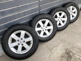 Комплект оригинальных дисков с шинами на Ниссан за 220 000 тг. в Алматы