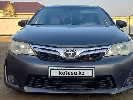 Toyota Camry 2013 года за 7 100 000 тг. в Атырау