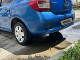 Renault Logan 2014 года за 2 100 000 тг. в Актобе – фото 4