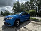 Renault Logan 2014 года за 2 100 000 тг. в Актобе – фото 3