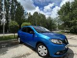 Renault Logan 2014 года за 2 100 000 тг. в Актобе – фото 2