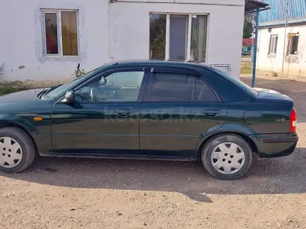 Mazda 323 1998 года за 1 400 000 тг. в Алматы – фото 2