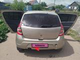 Renault Sandero 2013 годаүшін3 100 000 тг. в Рудный – фото 2