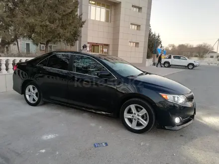 Toyota Camry 2014 года за 8 600 000 тг. в Жанаозен