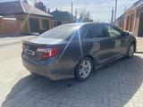 Toyota Camry 2014 года за 5 500 000 тг. в Актобе – фото 2