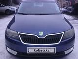 Skoda Rapid 2014 годаfor6 800 000 тг. в Алматы