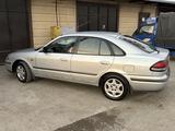 Mazda 626 1997 года за 2 650 000 тг. в Шымкент – фото 4