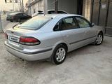 Mazda 626 1997 года за 2 650 000 тг. в Шымкент – фото 3