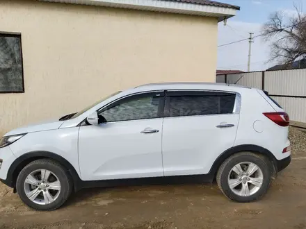 Kia Sportage 2013 года за 6 200 000 тг. в Кульсары – фото 2