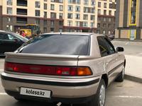 Mazda 323 1993 годаүшін1 400 000 тг. в Астана