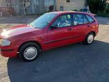 Mazda 323 1999 года за 2 300 000 тг. в Караганда – фото 3