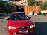 Mazda 323 1999 года за 2 300 000 тг. в Караганда – фото 2