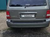 Kia Carnival 2005 года за 4 900 000 тг. в Актобе – фото 3