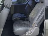Kia Carnival 2005 года за 4 200 000 тг. в Актобе – фото 5