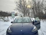 Tesla Model Y 2023 года за 21 000 000 тг. в Алматы