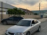 Mazda 626 1998 года за 1 200 000 тг. в Жанаозен – фото 3