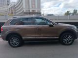 Volkswagen Touareg 2011 годаүшін10 500 000 тг. в Астана