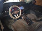 Kia Sportage 2013 года за 7 800 000 тг. в Шахтинск – фото 2