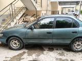 Toyota Corolla 1993 года за 550 000 тг. в Шымкент – фото 4