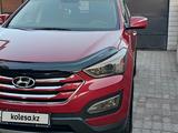 Hyundai Santa Fe 2014 года за 10 700 000 тг. в Конаев (Капшагай)