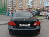 Toyota Corolla 2009 годаүшін3 980 000 тг. в Астана – фото 2