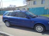 Mazda 323 2001 года за 1 450 000 тг. в Алматы – фото 5