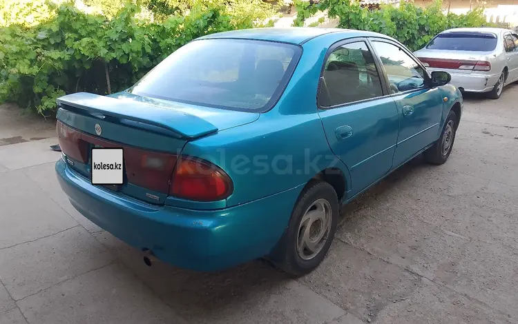 Mazda 323 1997 годаүшін700 000 тг. в Алматы
