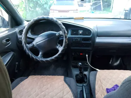 Mazda 323 1997 года за 700 000 тг. в Алматы – фото 4