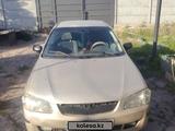 Mazda 323 1998 годаүшін2 400 000 тг. в Шымкент