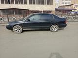 Toyota Carina E 1997 года за 2 000 000 тг. в Астана – фото 2