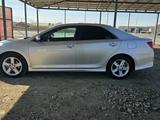 Toyota Camry 2013 года за 5 500 000 тг. в Атырау