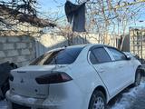 Mitsubishi Lancer 2010 года за 10 000 тг. в Алматы – фото 2