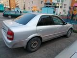 Mazda 323 2002 года за 1 500 000 тг. в Астана – фото 4