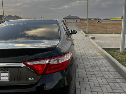 Toyota Camry 2015 года за 6 200 000 тг. в Актобе – фото 7