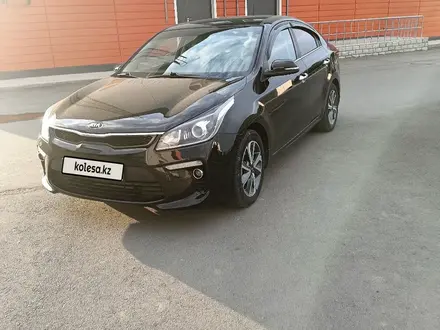 Kia Rio 2018 года за 7 500 000 тг. в Актобе – фото 4