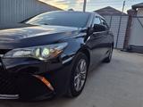 Toyota Camry 2015 года за 6 800 000 тг. в Атырау